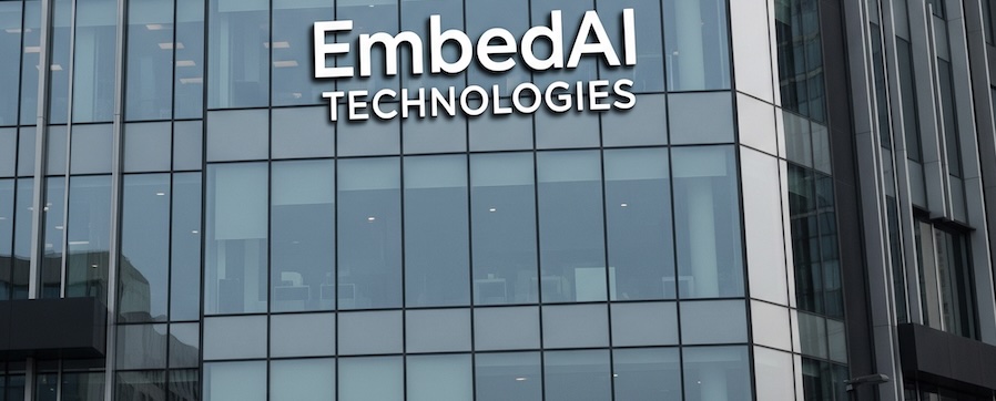 Modern glass office building representing EmbedAI Technologies headquarters in a tech district